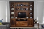 EU 154 - All our Entertainment Units can be customized in size to suit your individual room. They can be made with a variety of solid timbers including Tasmanian Blackwood, Blue Gum, Tasmanian Oak, Jarrah, Blackbutt and many more. Give us a call with your requirements for an obligation free quote.