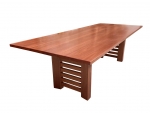 Mira Dining Table - 
Designer: Kim Francis 2009 - 

Modern looks with a 32mm thick top and trestle style base, made from select Austarlian Hardwood of your choice. Shown here in select Sydney Bluegum and Blackbutt, as well as Red Mahogany and Blackbutt.